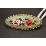 A vintage micro mosaic brooch