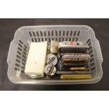 A collection of vintage cigarette cases and cigarette lighters, travel shaving set etc