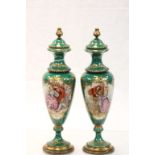 Pair of Limoges ceramic Urns with fixed lids