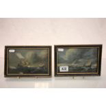 Pair of framed & glazed Oils on board of Ships in stormy Seas with inscriptions to verso
