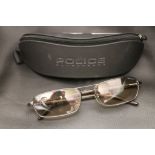 Pair of cased designer Police Italian sunglasses