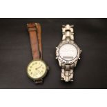 A vintage military watch with modern Gents watch