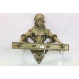 Heavy Brass pipe rack in the form of a Female in a Bonnet