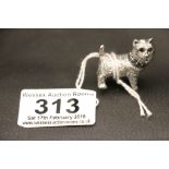 A cast silver scottie dog figure