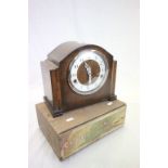 Wooden Cadbury's Dairy Milk Chocolate box with paper labels and a wooden cased mantle clock with