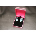 A pair of silver and enamel heart shaped pendant earrings, cased