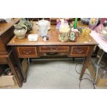 19th century Mahogany and Cross-banded Writing Desk with Three Drawers and shaped apron, raised on