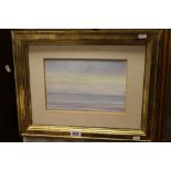 John Reay (1947-2011) gilt framed painting of a seascape by John Reay titled Early Morning Seascape