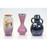 Three glazed pottery vases to include Torquay Ware and a large painted glass Fruit bowl