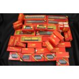 42 Boxed Hornby & Triang OO gauge items of rolling stock to include trucks, wagons and trucks