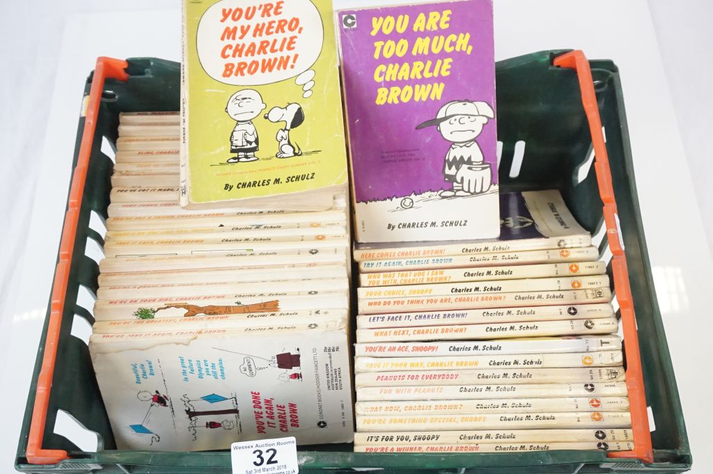 Thirty four Snoopy and Charlie Brown 1970s softback books