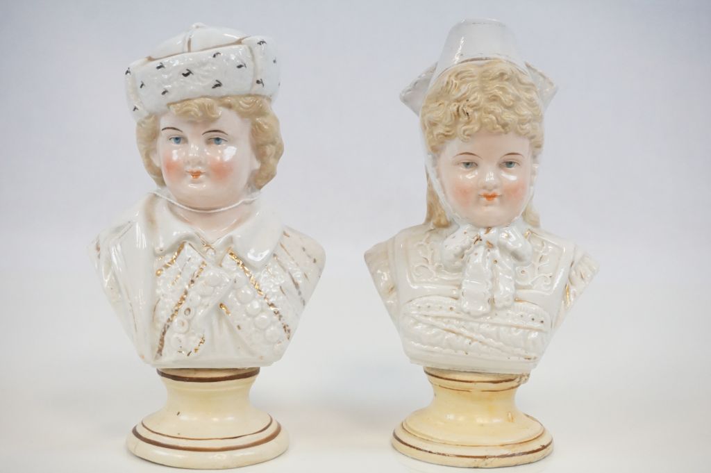 Pair of European busts of Male & Female in traditional costume