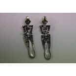A pair of silver marcasite and moonstone Art Deco style drop earrings
