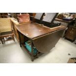 Large 17th century Style Oak Gate-leg Table with Oval Flaps raised on turned supports with square