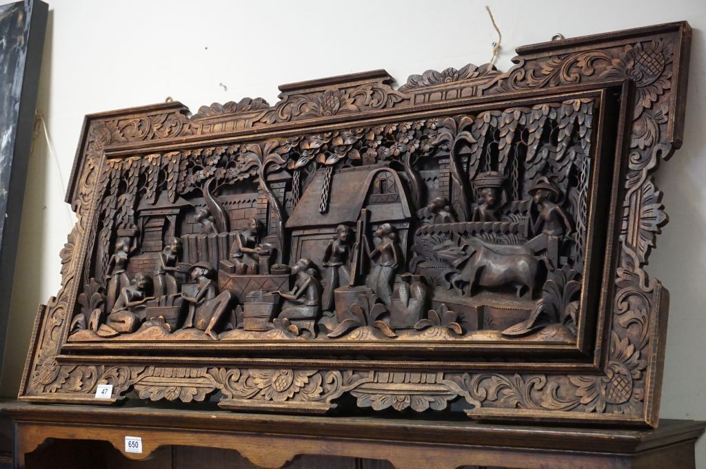 Carved Asian Wooden wall plaque depicting a Harvest scene