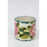 A Wemyss Goode and Co hand painted squat circular cabbage rose pot, two large hand painted roses and