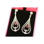 A pair of silver marcasite and ruby Art Deco style earrings, cased