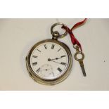 A Victorian silver open faced pocket watch, white face with black Roman numerals and hands,