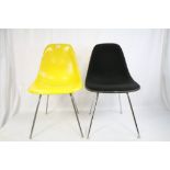 Herman Miller Eames Yellow DSX Shell Chair stamped Herman Miller to base together with a similar