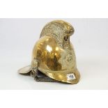 Brass Fire Helmet, the badge marked National Fire Brigade Association with Dragon motif to the