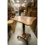 William IV Mahogany Pedestal Table with Shaped Square Top and raised on a platform base