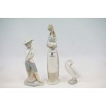 Nao Figure of a Boy with Sling Shot, Nao Girl holding a Ducj and Lladro Goose