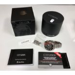 A cased Citizen Eco-Drive Gents stainless stell wristwatch, with spare links, instruction manual,