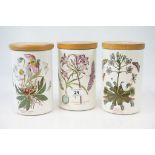 Three Portmeirion Storage jars in Botanic Garden pattern with wooden lids