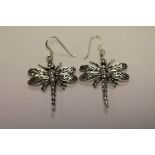 A pair of silver dragonfly earrings