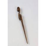 A carved hardwood letter opener, length approximately 23cm