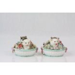 A pair of Meissen style hand painted ornaments; a pair of basket weave baskets with applied pink