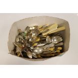 Assorted flatware to include Art Deco ivorine handled fish knives and desert knives, tea strainer,
