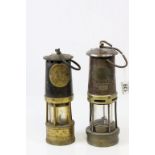 Two vintage Miners lamps to include; Ackroyd & Best Ltd & E Thomas & Williams Ltd makers