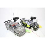 Two Remote Control Racing Cars - Subaru and Nissan