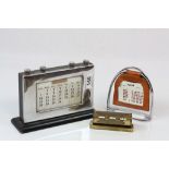 Two Early 20th century Desk Calendars and a Calendar set within a Horse Stirrup