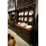 Mid 20th century Oak Dresser with Shelves over Two Carved Front Drawers and Two Carved Cupboard