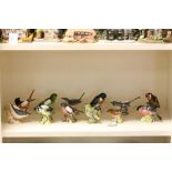 Group of 12 Beswick & Goebel ceramic birds
