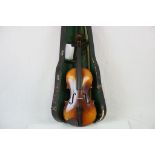 Cased violin and bow