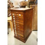 Early 20th century Teak Office Filing Cabinet of Fourteen Stationery Drawers with Copper Effect