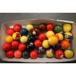 Two Sets of Billiard Balls and a Square