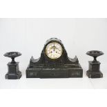 Marble inlaid striking Slate Mantle clock with matching Garnitures, marked C.V to movement