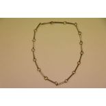 An 18ct yellow gold and silver chain