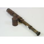 Brass three draw telescope with leather cover and marked "Joseph Levi & Co London"