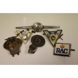A vintage AA car badge, two Company of Veteran Motorists car badges, an RAC car plaque, Royal