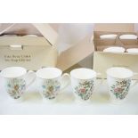 Two boxed sets of six Aynsley coffee mugs, one in Pembroke the other Wild Tudor pattern