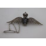 A diamond, sapphire and enamel white gold Royal Air Force (RAF) 'Wings' sweetheart brooch, seventy