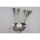 A pair of George II silver table spoons, rat tail pattern stem, initialled terminals to reverse,