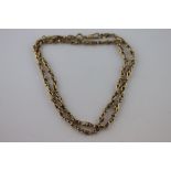 A Victorian 9ct yellow gold fancy link albert chain style necklace, the toggle forming the clasp,