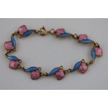 Arne Nordlie, a Norwegian enamelled silver gilt child's bracelet, pink enamelled roses attached to