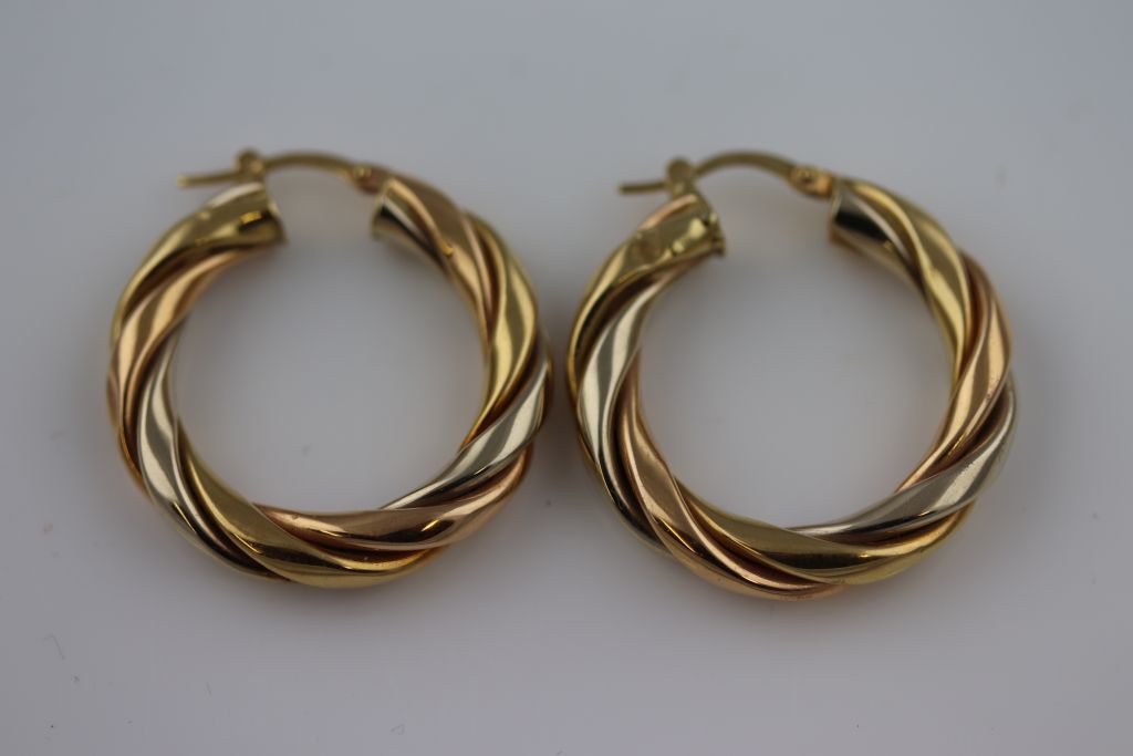 A pair of unmarked gold twisted hoop earrings, subtle tri-colour gold finish, diameter - Image 5 of 7